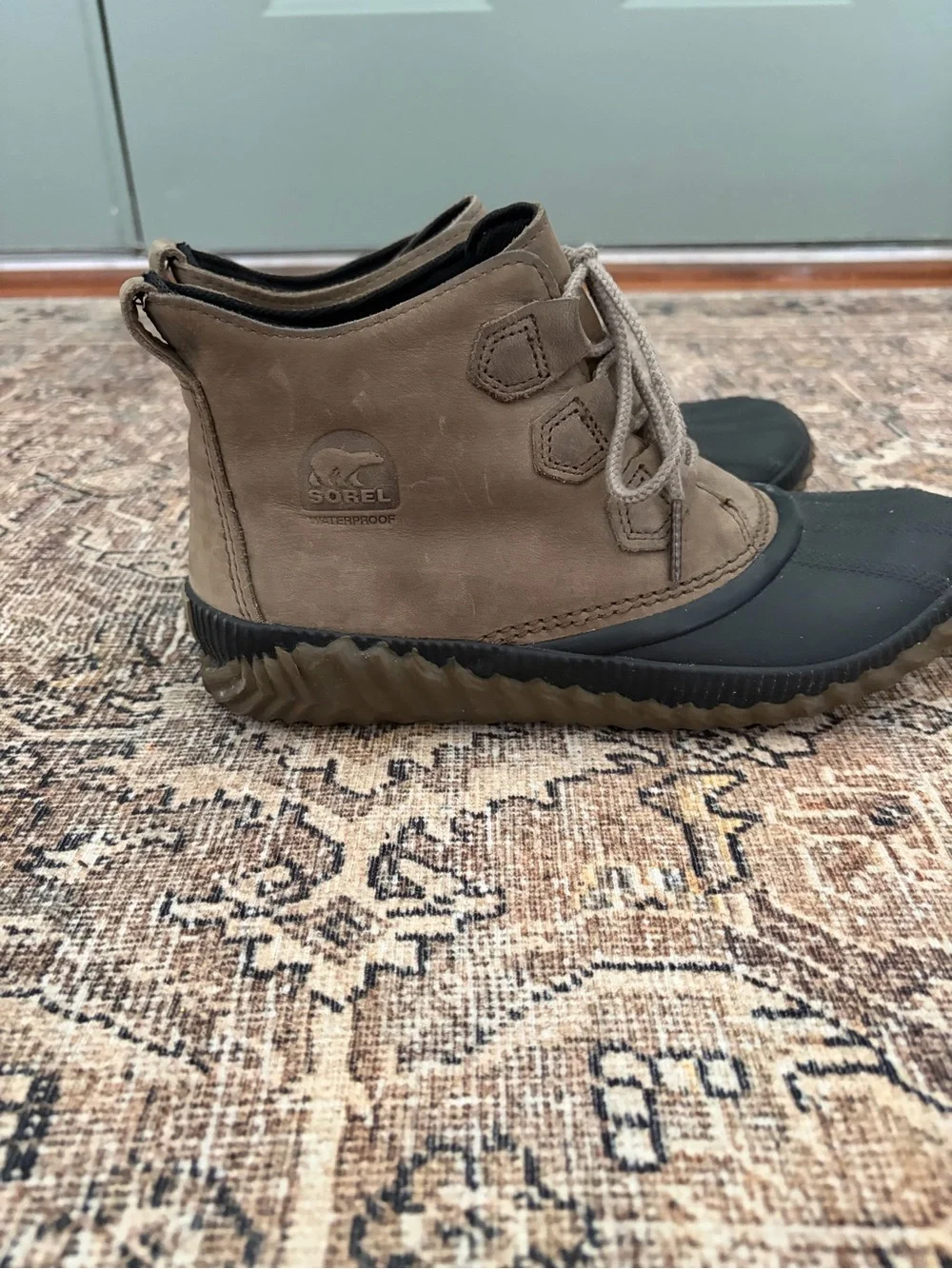 Sorel women’s Out N About Plus Duck Boots in brown, size 9